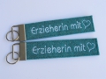 Schlüsselanhänger Erzieherin mit Herz  / (Farbe) türkis/ weiße Schrift